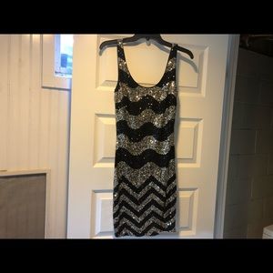 Size small Bebe gorgeous black and gold glitter dress!